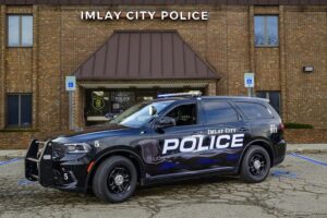 Imlay City Police SUV in front of station.